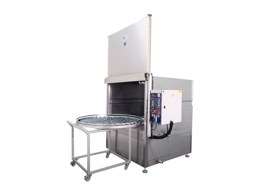 Front loading spray parts washer with the front door open, side view